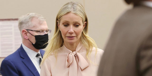 Gwyneth Paltrow wears a pink blouse from her Goop collection to court on Tuesday.