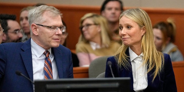 Gwyneth Paltrow and her attorney Steve Owens smile after the reading of the verdict.