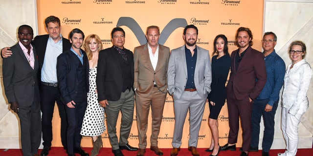 The cast of "Yellowstone" poses on the red carpet.