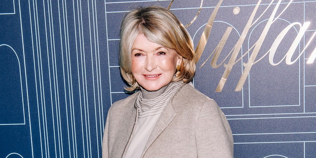 Martha Stewart smiles on red carpet