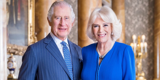 Queen Consort Camilla wears royal blue dress with King Charles