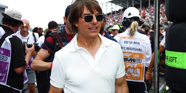 Tom Cruise wears white polo shirt and sunglasses at F1 Grand Prix in Miami