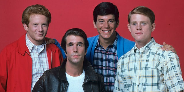 Fonzie (Henry Winkler), Richie (Ron Howard), Potsie (Anson WIlliams) and Ralph (Don Most) in a picture from season 2 of "Happy Days" with all men but Fonzie wearing plaid shirts