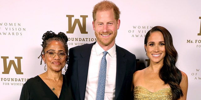 Dora Ragland wears black dress with Meghan Markle and Prince Harry at women foundation event