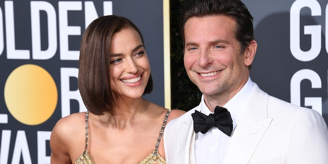 Bradley Cooper wears white tux to Golden Globes with Irina Shayk