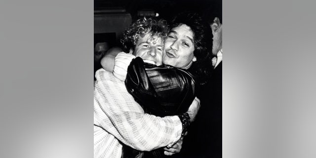 Sammy Hagar hugging Eddie Van Halen