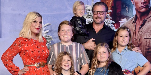 Tori Spelling and her family at premiere of "Jumanji"