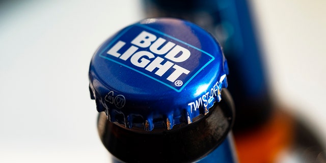 bud light blue bottle cap with white writing