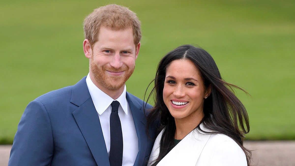 Prince Harry and Meghan Markle smile at Kensington Palace