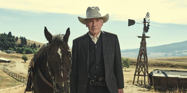 Harrison Ford walks with a horse in "1923"