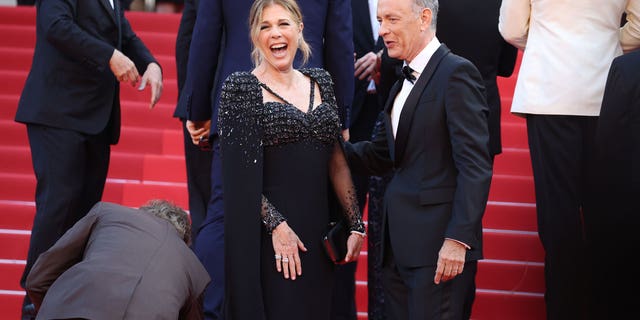 Rita Wilson laughs on red carpet with Tom Hanks