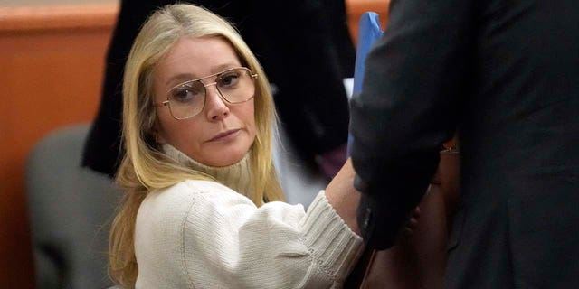 Gwyneth Paltrow wore a cream sweater and glasses for her first court appearance Tuesday at her trial. Some on social media compared her oversize glasses to serial killer Jeffrey Dahmer's. 