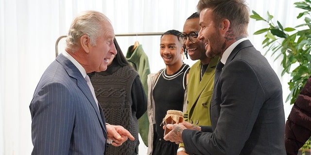 King Charles talking with David Beckham