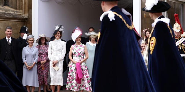 Kate Middleton watches Prince William during the Order of the Garter
