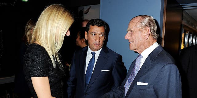 gwyneth paltrow shaking hands with prince philip