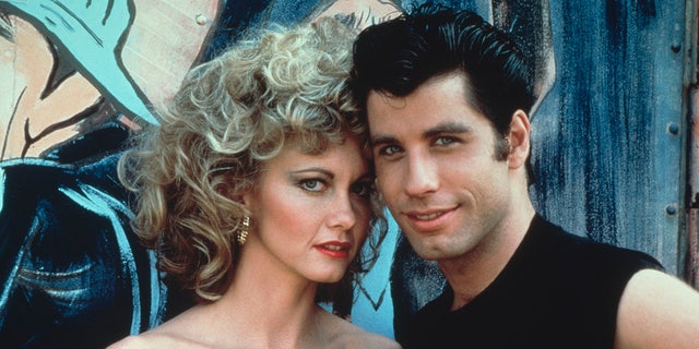 John Travolta and Olivia Newton-John as Sandy and Danny in Grease