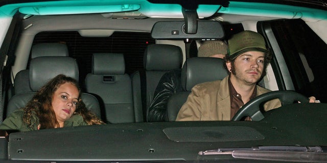 Bijou Phillips and Danny Masterson in a car