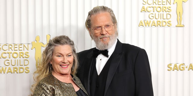 Jeff Bridges with his wife Susan Geston on a red carpet