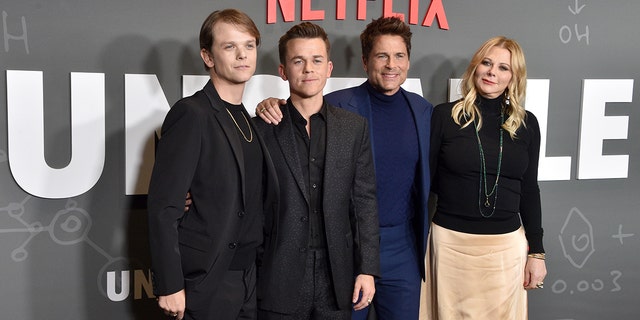 Rob Lowe stands next to his two sons, Matthew and John Owen and wife, Sheryl on the red carpet premiere of his show "Unstable," which also stars his son John Owen