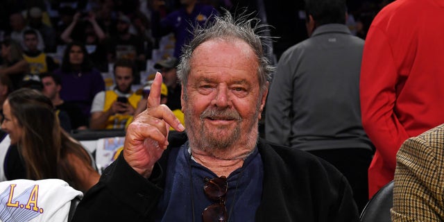 Jack Nicholson holding up finger at Lakers Game