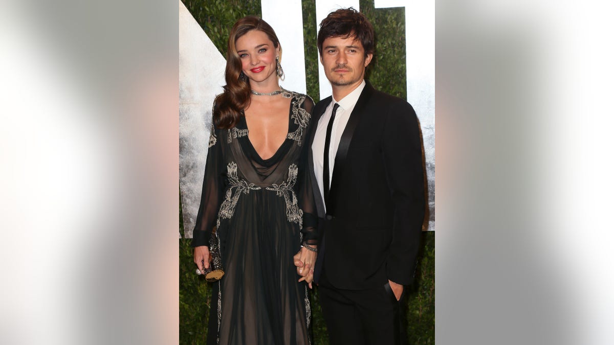 Miranda Kerr and Orlando Bloom at Vanity Fair Oscar party in 2013