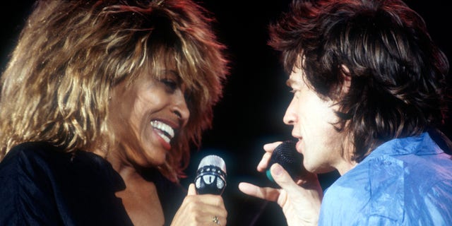 Tina Turner and Mick Jagger in 1985