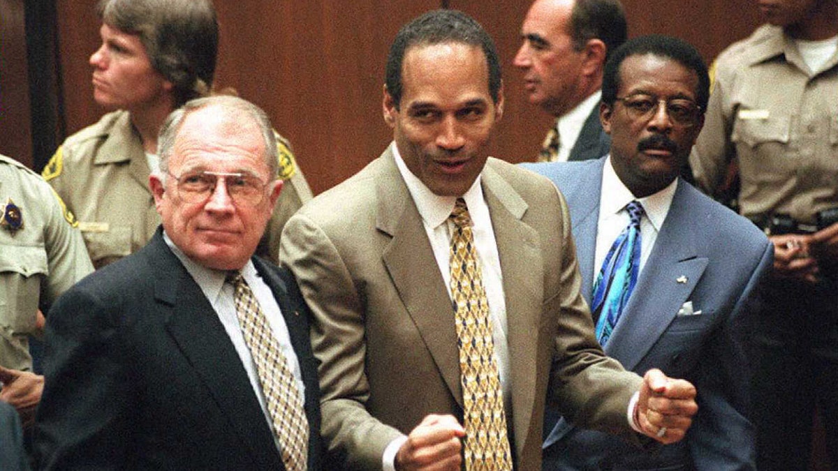 O.J. Simpson reacts to the not guilty verdict