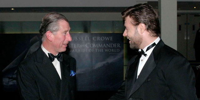 Prince Charles and Russell Crowe shake hands