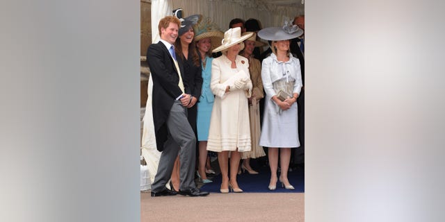 Kate Middleton laughs with Prince Harry