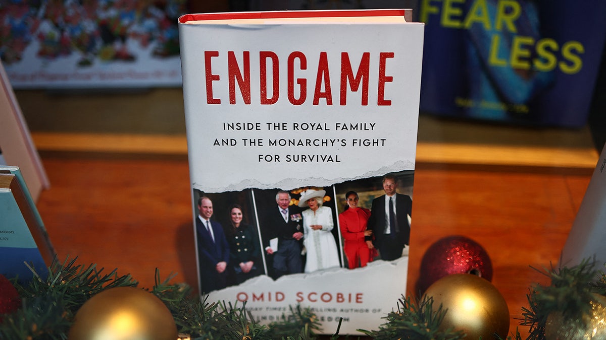 A close-up of the book Endgame surrounded by Christmas decorations
