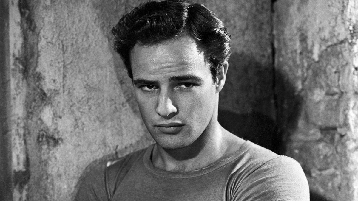 A close-up of Marlon Brando looking sternly