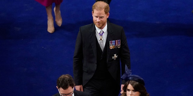 Prince Harry walking in Westminster Abbey