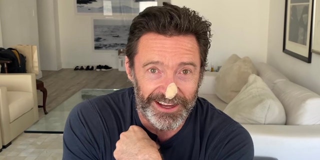 Hugh Jackman wanted to let his fans know why he has a bandage on his face.