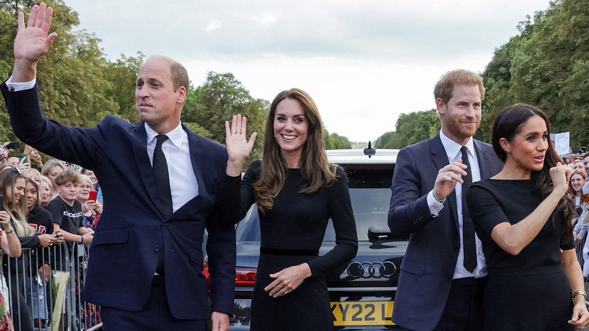Prince William, Princess Catherine, Meghan and Harry wave at the crowd