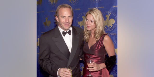 Kevin Costner and wife attend a premiere