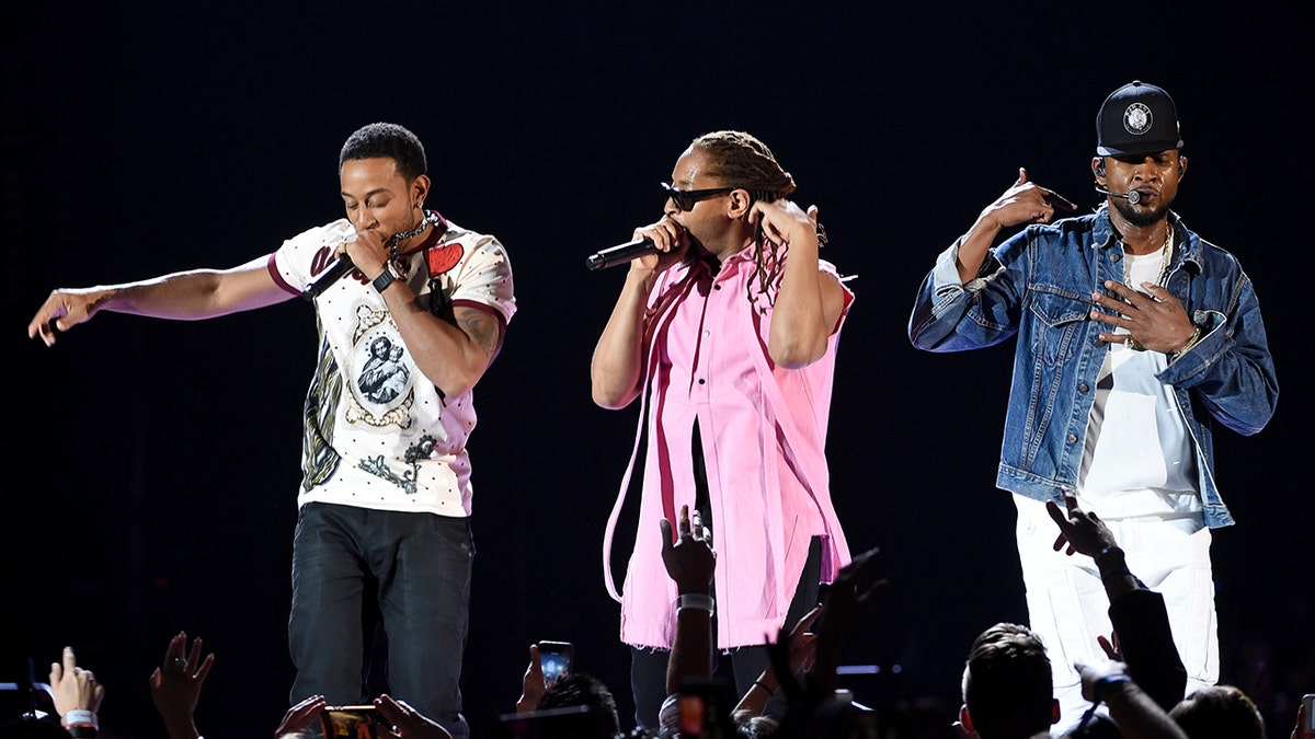 Ludacris, Lil Jon, and Usher performing together