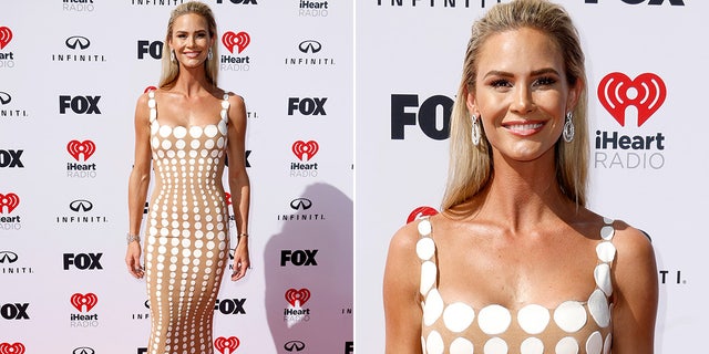Meghan King was seen in a nude-and-white-colored polkadot dress. The reality star had her blonde hair styled down and combed back, showing off her statement silver earrings.