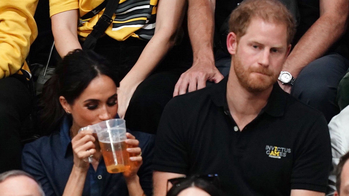 Meghan Markle sips on a beer at Invictus Games