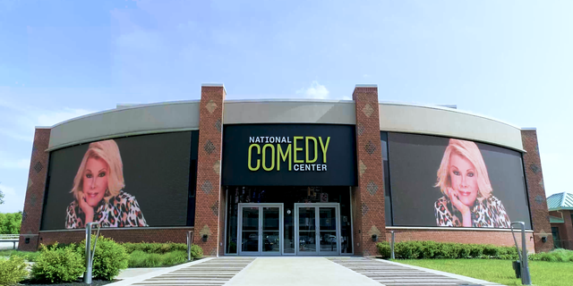 Exterior of the National Comedy Center with Joan Rivers signage.