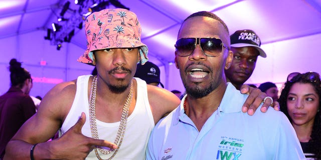 Nick Cannon and Jamie Foxx at a celebrity golf tournament