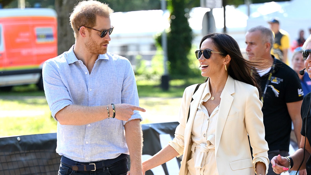 Prince Harry and Meghan Markle laugh