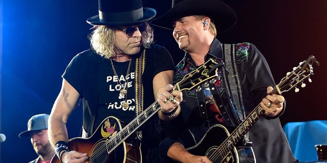 Country stars Big & Rich perform on stage at a concert