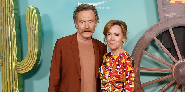 Bryan Cranston and wife Robin coordinate in groovy attire at Asteroid City premiere