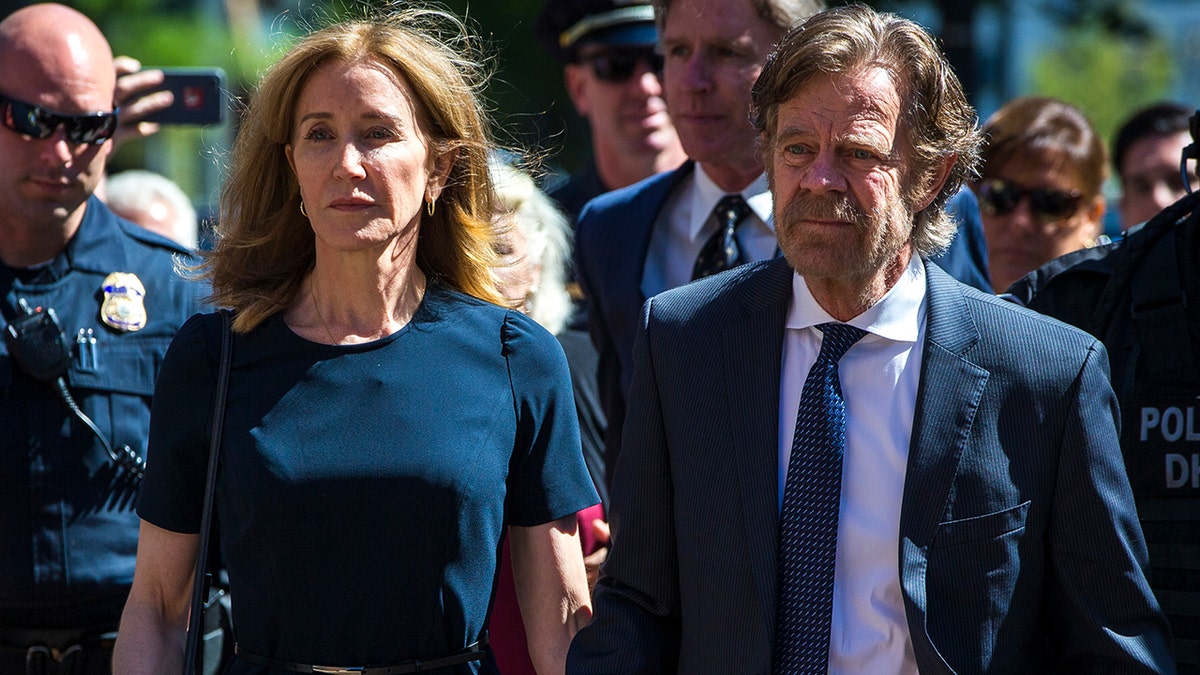 Felicity Huffman and William H. Macy in court