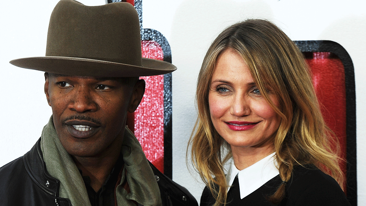 Jamie Foxx wears a wide-brimmed hat on the red carpet with Cameron Diaz