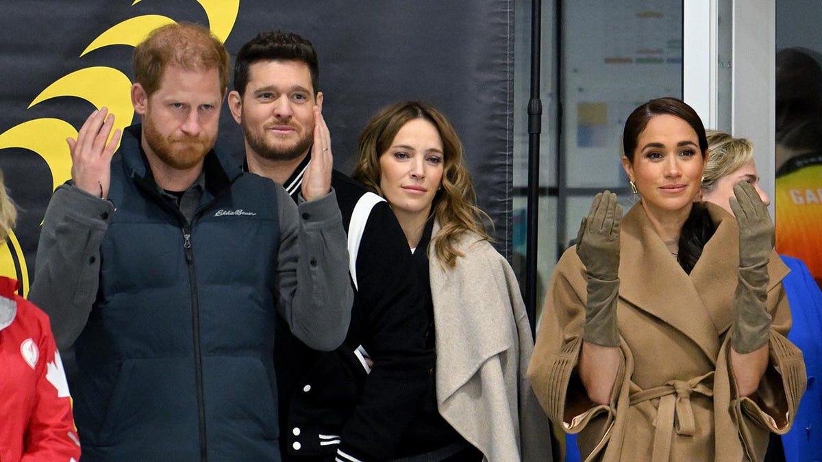 Michael Bublé and Prince Harry with their wives