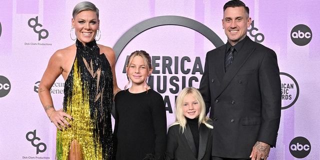 Pink attends American Music Awards with husband and kids