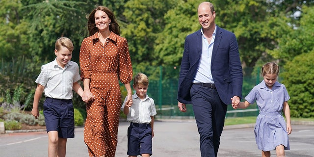 Prince William walking with royal family