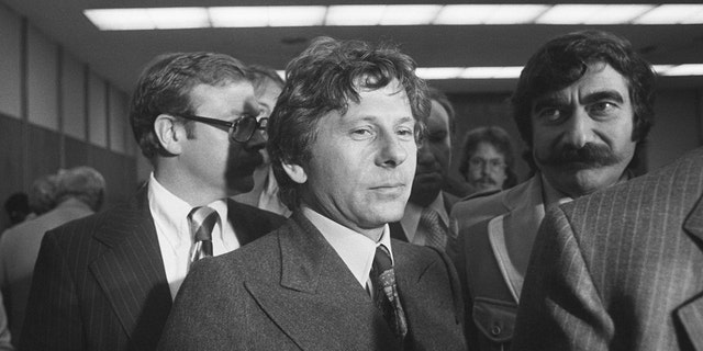 Roman Polanski wears a suit and tie in Santa Monica courthouse