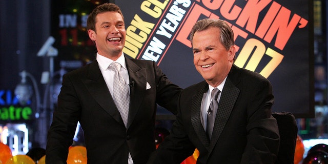 Ryan Seacrest laughs with Dick Clark on annual new Year's Eve broadcast